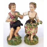 Pair of Derby figures circa 1800   modelled as a girl and boy sat with floral chains, incised No. 36