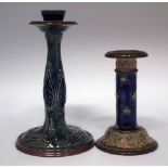 Two Royal Doulton stoneware candlesticks,   moulded with Art Nouveau patterns, impressed marks to