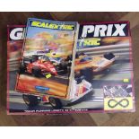 Scalextric "Grand Prix" set and three magazines. Condition report: see terms and conditions