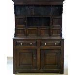 Oak Denbigh dresser mid 18th century, the boarded and canopied plate rack back with six small