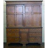 Oak housekeeper's cupboard, 19th century, the upper part of two sliding panelled doors, on a base of