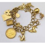 9ct gold charm bracelet hung with a 1911 George V gold sovereign and eleven other charms, 53.5g