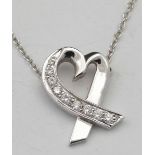 Tiffany & Co Paloma Picasso 750 white gold and diamonds "Loving Heart" pendant, on its Tiffany white