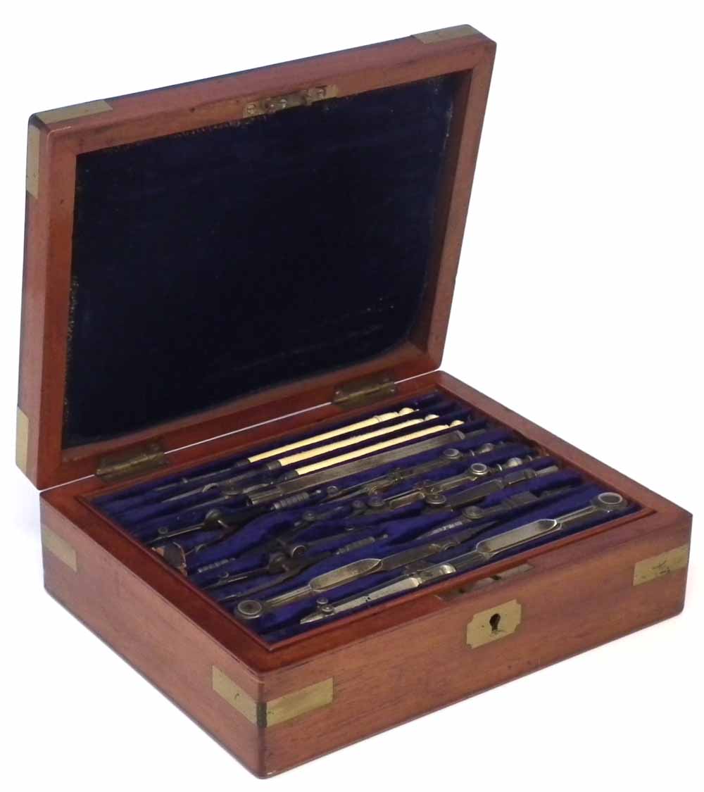 Mahogany cased technical drawing instrument set with three tiers, fitted out with ivory rulers and