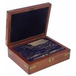 Mahogany cased technical drawing instrument set with three tiers, fitted out with ivory rulers and