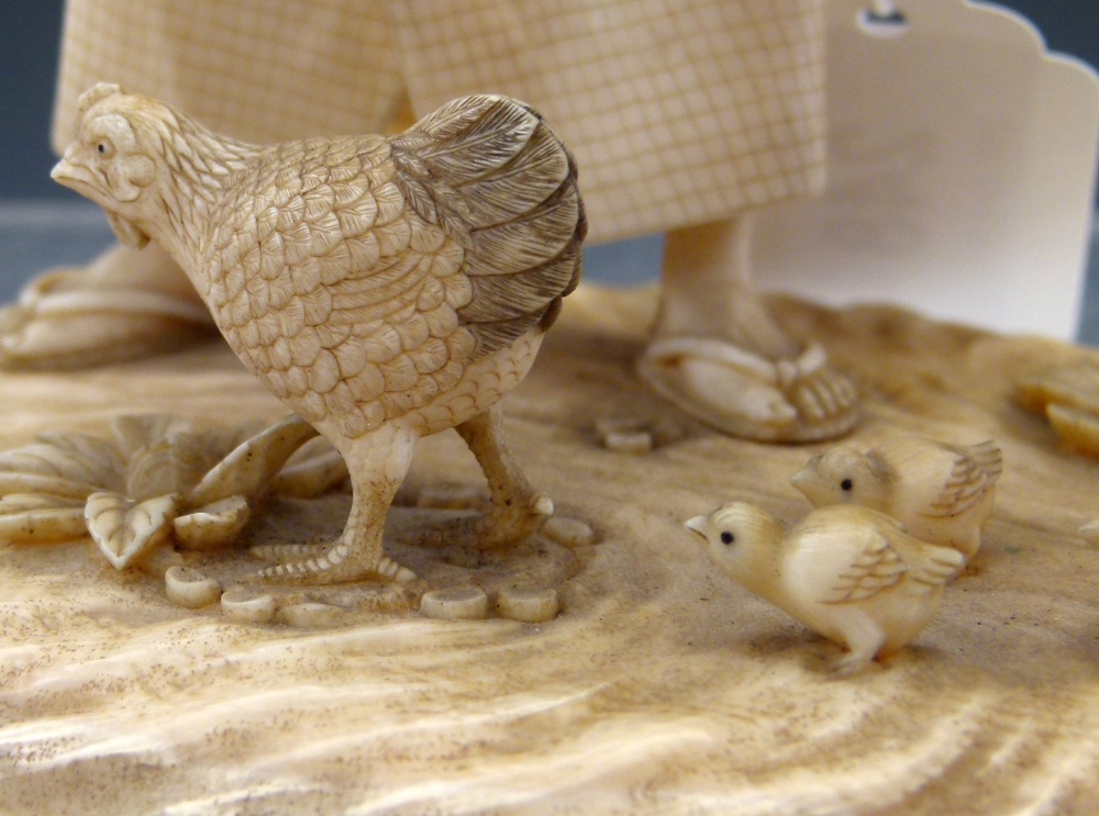 Japanese ivory okimono of a farmer holding a basket above a hen and chicks, Meiji period, signed - Image 5 of 10