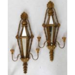 Pair of Italian gilt wood and mirrored semi-hexagonal girandoles, both with two scrolling