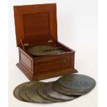 Regina musical disc playing polyphon, No 37061, in a mahogany box together with nine 40cm discs.