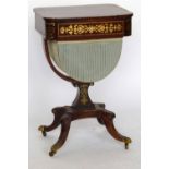 Rosewood work table inlaid with cut card brass, early 19th century, the rectangular top with rounded