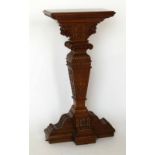 Edwardian oak pedestal, the rectangular top on a renaissance style column and cruciform base, height