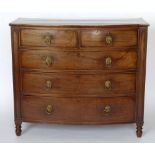 Early Victorian mahogany bow-fronted chest of two short and three long drawers with replacement lion