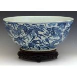 Chinese blue and white large bowl, late 19th century, painted with a continuous scene of writhing