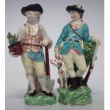 Two Derby figures of Gentlemen circa 1780 one modelled with gun dog and sporting gun, the other with