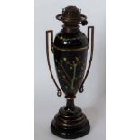 Victorian oil lamp, decorated with Oriental trees and insects on a black 'Jackfield' type glaze,