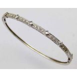 14k gold and diamond hinged bangle, the half hoop set with round and princess cut stones, 8.6g