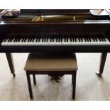 Steck mahogany baby grand piano, length 140cm.