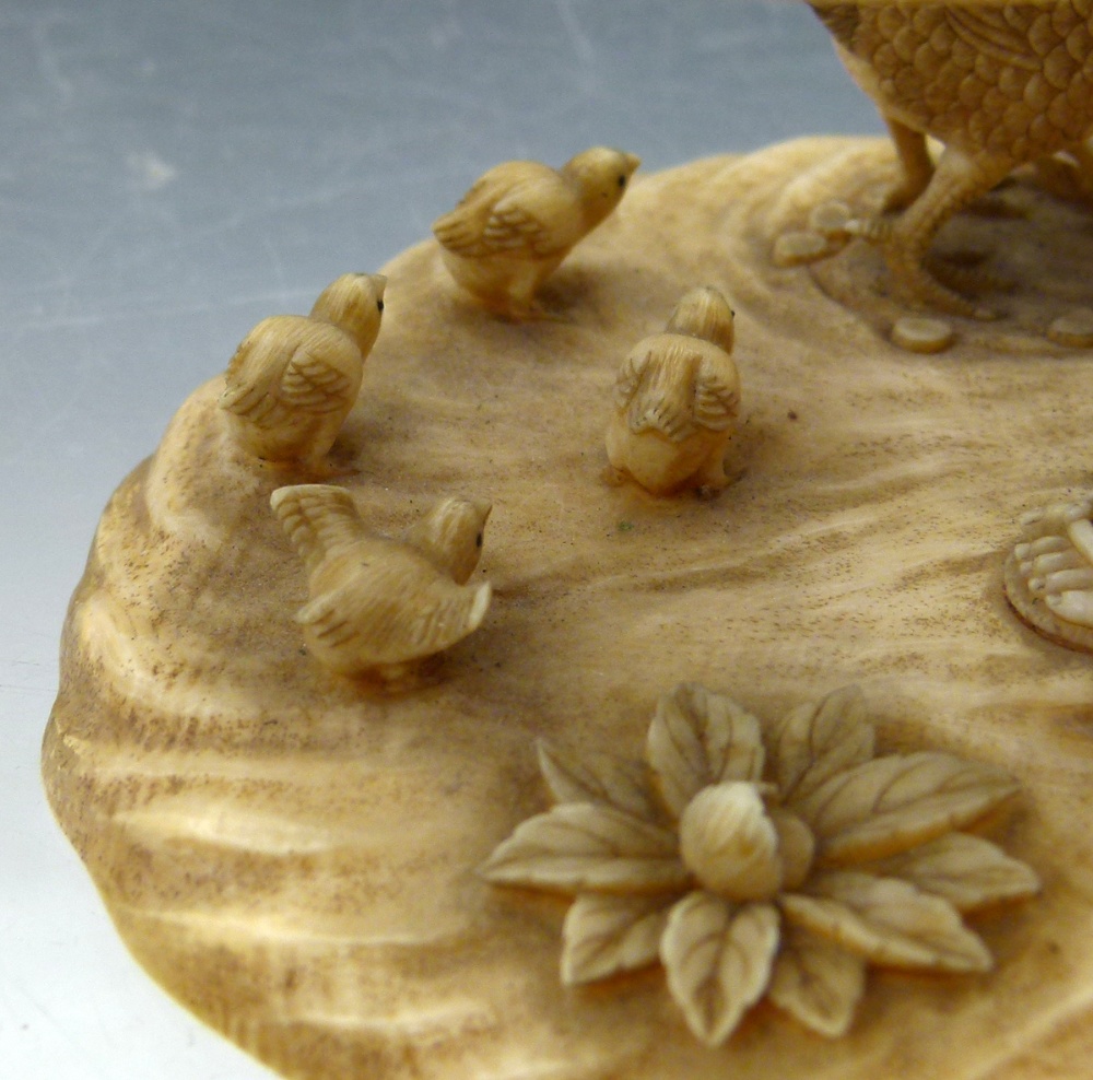 Japanese ivory okimono of a farmer holding a basket above a hen and chicks, Meiji period, signed - Image 7 of 10