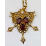 9ct gold garnet and seed pearl antique style pendant on chain, 17.0g gross.