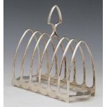 Silver toast rack for six slices, Walker & Hall, Sheffield 1894, 11oz 16dwt, length 18cm.