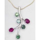 Ruby and green diamond (irradiated) floral spray pendant of unmarked white gold, length 45mm, on