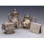 Pair of German 800 silver small tea and coffee pots with spirally fluted decoration, 12cm, 15cm;