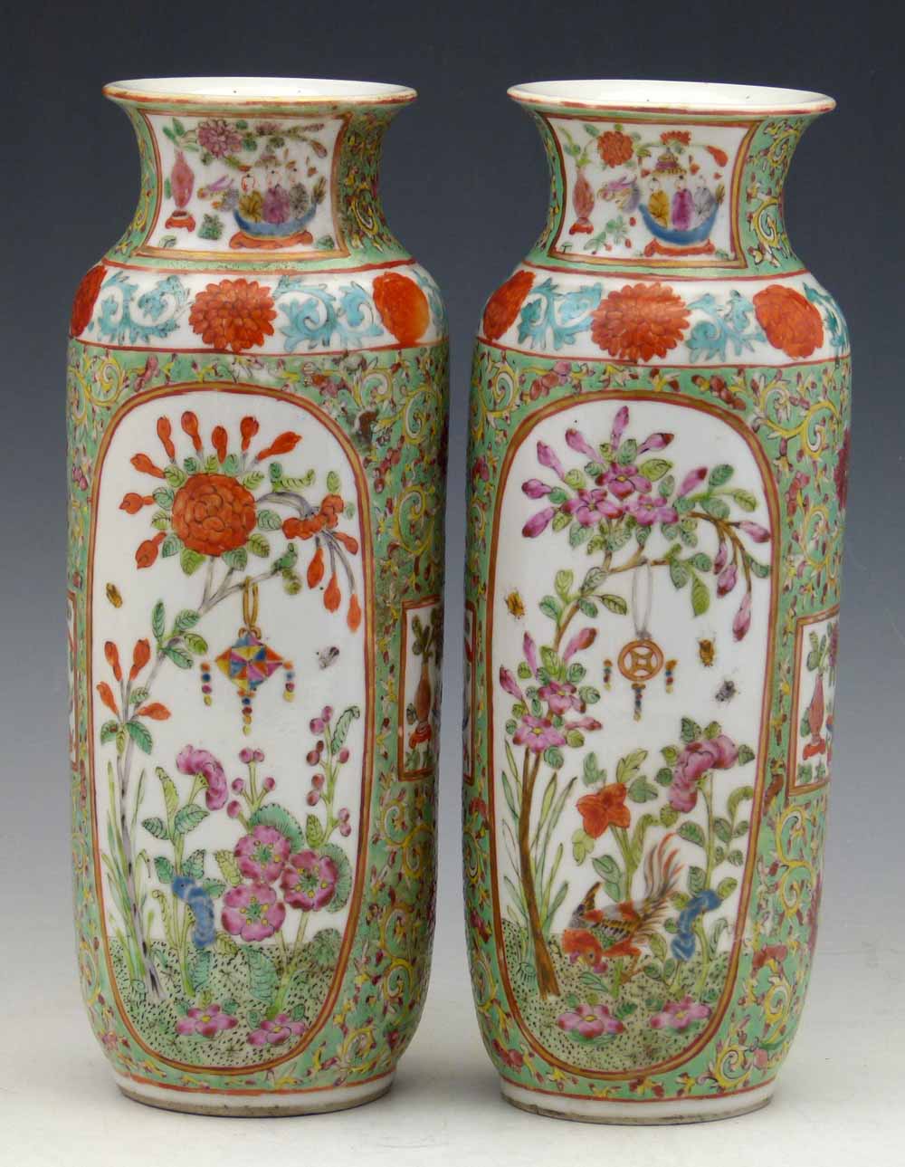 Pair of Cantonese vases, 19th century, painted in enamels with floral panels on a ground of