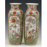 Pair of Cantonese vases, 19th century, painted in enamels with floral panels on a ground of