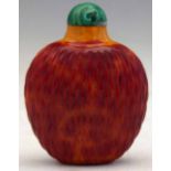 Glass imitation realgar basket weave snuff bottle of red and orange colour, green malachite efect
