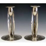 English Pewter pair of Tudric candlesticks, 0223, after the design of Archibald Knox, height 23cm.