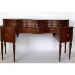 Mahogany serpentine kneehole sideboard, 19th century, the low back of two doors over three shallow