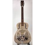 Dobro Steel string resonator guitar, serial number A8 595 94B, decorated with palm trees and a lake,