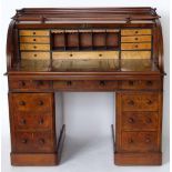 Victorian mahogany cylinder top pedestal bureau, the interior fitted with a pull-out writing