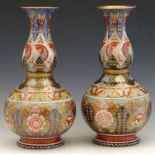 Pair Japanese imari bottle vases, 20th century, decorated in enamels and gilt, Arita mark in gilt to