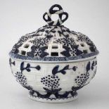 Derby Chestnut basket and cover circa 1760,   painted with a Chinoiserie landscape in underglaze