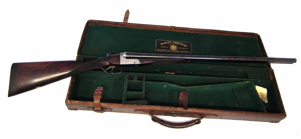 12 bore box lock ejector side by side shotgun, serial number 14181, with sleeved 28 inch barrels,