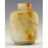 Stout white jade snuff bottle, the rectangular body with russet inclusions and natural indentations,