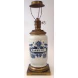 Delft drug jar   made into a lamp base, painted in blue and white and labelled 'C. Marrbii' early