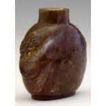 Moss agate snuff bottle of reddish purple ground with similarly coloured filaments and inclusions,