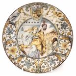 Maiolica plate probably Castelli,   painted with Judith holding the head of Holofernes, the border