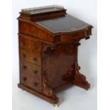 Victorian inlaid burr walnut davenport desk, width 56cm.
 
Condition report: this item has been