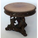 Burmese hardwood circular low table (cut down) on carved base, diameter 59cm, height 51cm..