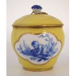 Sevres sucrier or lidded bowl,   painted in blue with a child studies on a yellow and gilt ground,