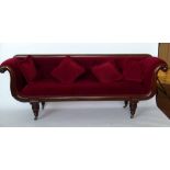 Victorian mahogany lyre-end settee upholstered in red velvet.