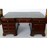 Reproduction Georgian mahogany partners' desk the skivered top over opposing drawers and doors,