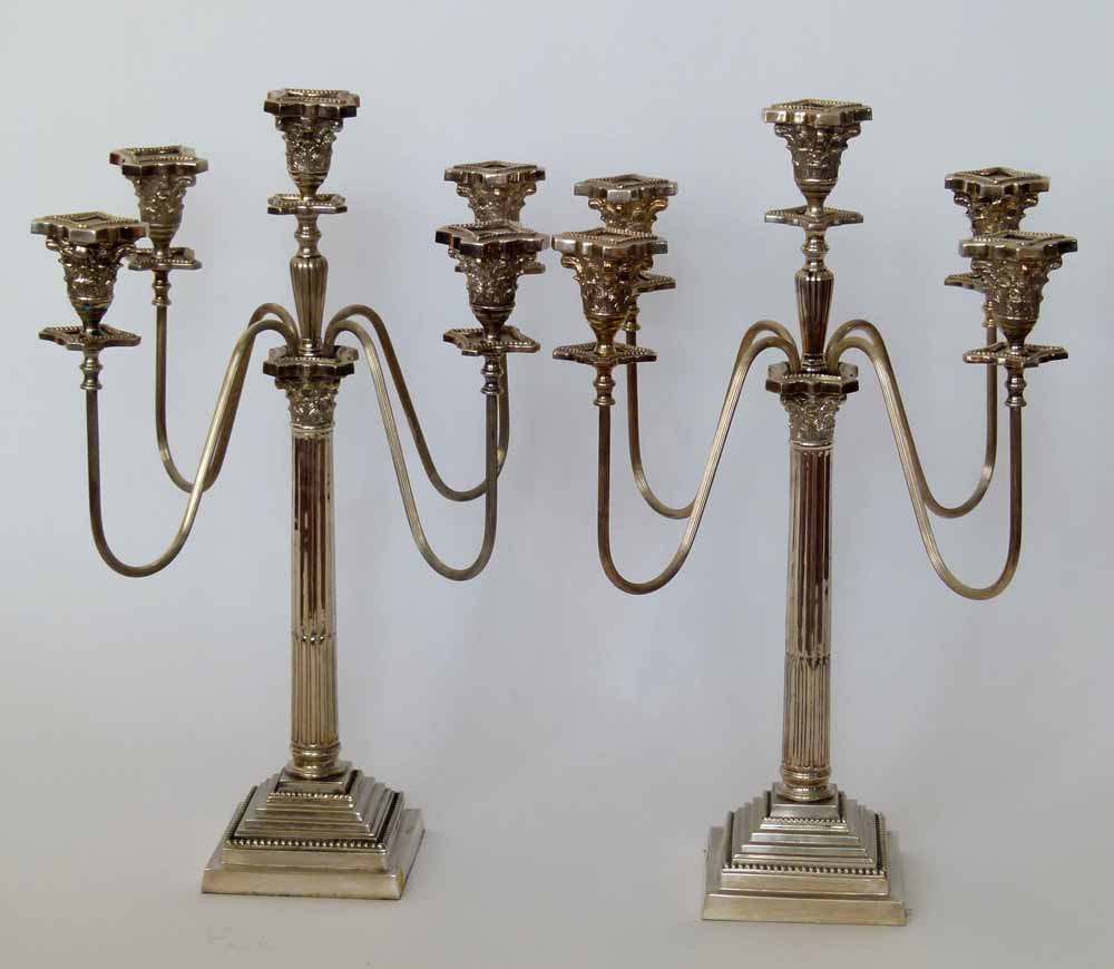 Pair of silver plated neo-classical candelabra both with four reeded branches, height 70cm.