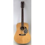 Vintage 12 String dreadnought guitar, serial number E400-12-N with mahogany back and sides.