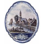 Dutch delft oval plaque,   painted with a river scene within moulded shaped framed edge, 19th