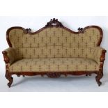 Victorian mahogany show-frame settee, heavily scrolled with a high back, length 200cm.