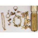 9ct gold charm bracelet, two bracelet chains, two rings, several ear studs and a stick pin.