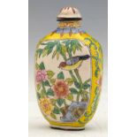 Canton enamel snuff bottle, painted on either side with floral panels on a yellow ground, Qianlong